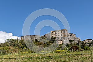 View of the historic center of Bomarzo, Viterbo, Italy, against the blue sky