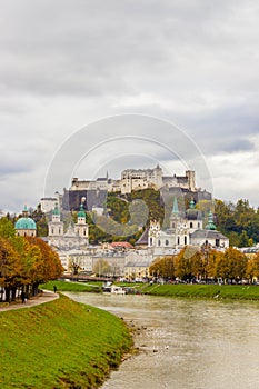 View of historic city of Salzburg over Salzach river, with Festung Hohensalzburg