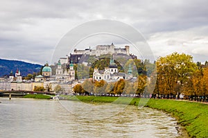 View of historic city of Salzburg over Salzach river, with Festung Hohensalzburg