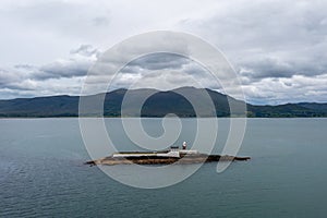 View of the historic Fenit Lighthouse on Little Samphire Island in Tralee Bay