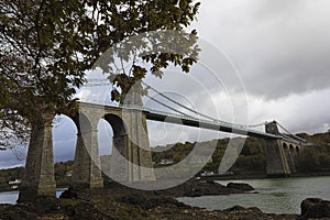 View of historic Menai Suspension Bridge from the Menai Straits, Isle of Anglesey, Wales