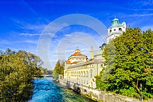 View on historic Mueller Volksbad next to Isar river - Munich photo