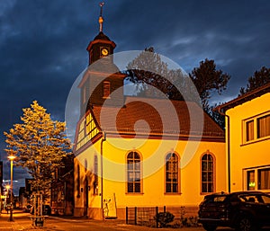 View of the historic protestant church of Walldorf in hesse during sunset