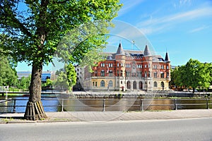 View of historical building by the river in city centre of Orebro