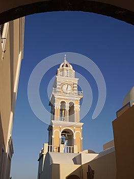 Cathedral of Saint John the Baptis. Typical urban landscape of Thira Santorini island,Greece photo