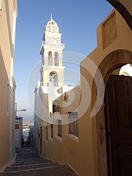 Cathedral of Saint John the Baptis. Typical urban landscape of Thira Santorini island,Greece photo