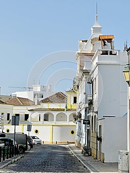 View of historical street in the old town Faro, Algarve, Portugal.