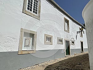 View of historical street in the old town Faro, Algarve, Portugal.