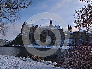 View of Hohenzollern Castle located on a rock on the shore of Danube River in Sigmaringen, Baden-WÃ¼rttemberg, Germany in winter.