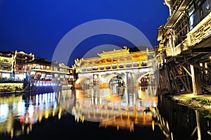 View of Hong bridge during twilight over the Tuojiang River Tuo Jiang River in Fenghuang old city Phoenix Ancient Town,Hunan