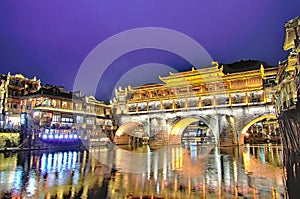 View of Hong bridge during twilight over the Tuojiang River Tuo Jiang River in Fenghuang old city Phoenix Ancient Town,Hunan