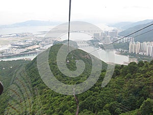 View of Hong Kong airport and Tung Chung from Ngong Ping cableway, Lantau island, Hong Kong