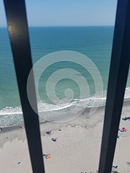 View hotelroom sand water beach