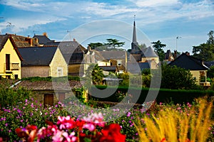 View of houses and church of Grez-Neuville photo