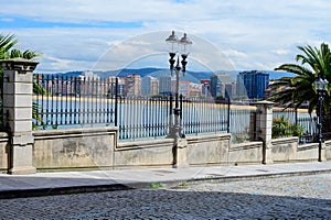 View on houses and San Lorenzo beach in Gijon, Asturias, Spain