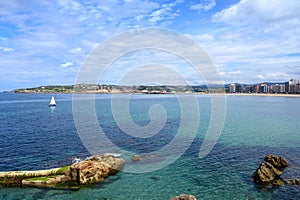 View on houses and San Lorenzo beach in Gijon, Asturias, Spain