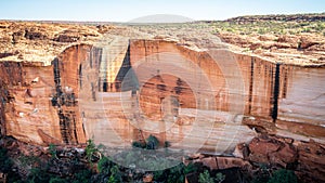 View of the huge cliffs walls of Kings Canyon in NT outback Australia