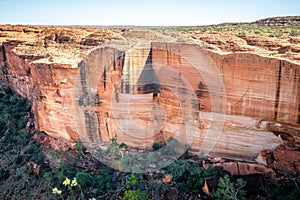 View of the huge cliffs walls of Kings Canyon in NT outback Australia