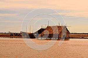 View of a hut on the banks of the huge Tonle sap lake