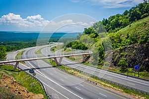 View of I-68 and a pedestrian bridge at Sideling Hill, Maryland.