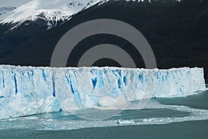 View of ice falling from the side of the Perito Moreno Glacier