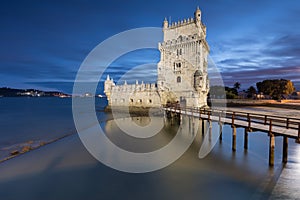 View of the iconic Belem Tower (Torre de Belem) in the bank of the Tagus River, in the city of Lisbon, Portugal. Unesco