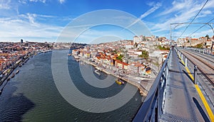 View of the iconic Dom Luis I bridge crossing the Douro River photo