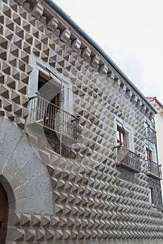 View at the iconic and touristic building peaks house facade, Casa de las picos, a Renaissance building on Juan Bravo street,