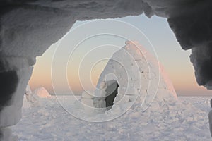 View from an igloo to another igloo in winter at sunset,  Novosibirsk, Russia