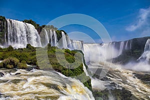 View of the Iguazu Falls. In the background, the Garganta del Diablo the Devil`s Throat. photo