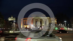 View of illuminated central square of Kutaisi with huge cascade structure of Colchis Fountain on spring night, Georgia