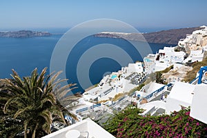 View of Imerovigli village with typical white Greek houses on Santorini island, Greece