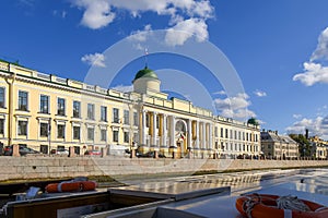 View of the Imperial School of Jurisprudence from a tourist cruise boat on the rivers and canals of Saint Petersburg, Russia