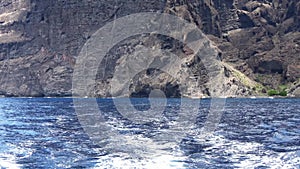 View the impressive rock formations of Les Gigantes from the ocean on Tenerife