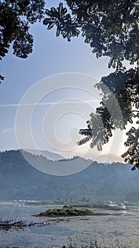 view Indah of the lake with a mountain background photo