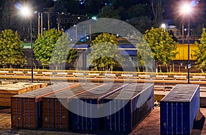 View of the industrial port in the evening - the road and railway for deliver goods to the ships for transportation by sea