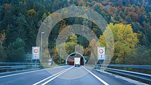 View from inside car and drive car going to in tunnel