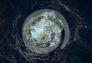 View from inside a cave looking out.