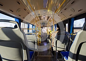 view from inside a city public transport bus at sunset