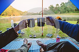 The view inside the couple`s tent is sitting in the morning coffee. Couple travel camping tents, Travel nature. Travel relax,