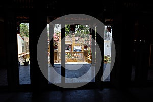 View from inside the entrance of the Van Thanh mieu Cam Pho temple in Hoi An, Vietnam