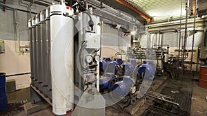 View inside of industrial room with the heating system of the building, efficient water treatment. Stock footage