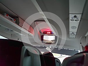A view inside the bus from the passenger seat.