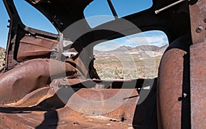 View from the inside, old rusted out car