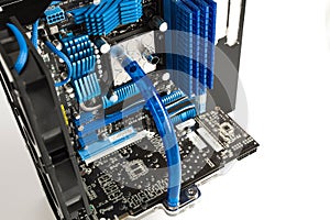 A view of inside of water cooled and high performance modern personal computer. Modding, PC, computing, motherboard, processor,