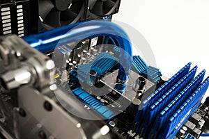 A view of inside of water cooled and high performance modern personal computer. Modding, PC, computing, motherboard, processor,