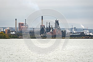View of an integrated steel mill on a cloudy autumn day photo