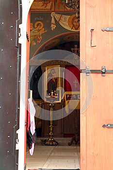 View of the interior decoration and icon through the doorway of the entrance to the church-chapel of St. Basil the Great in Moscow