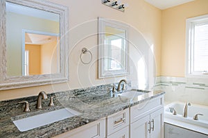 View of an interior of expensive elegant bathroom faucet