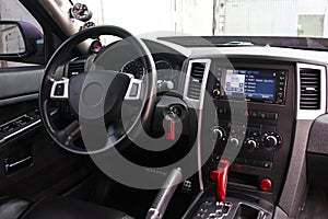 View of the interior of a modern automobile showing the dashboard